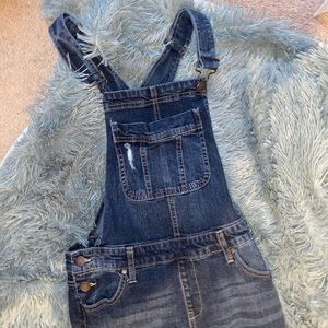 Denim overalls.